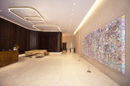 The sleek new lobby and painting by For The 'Friend' (2022) - Painted by Sam Gilliam at 122 Fifth Avenue in Manhattan