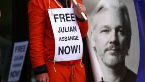 A supporter of Julian Assange protests in front of Westminster Magistrates Court in London, while calling for his release from Belmarsh Prison, on April 14.