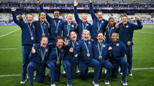 Team USA celebrates with their bronze medals during the victory ceremony during the Paris 2024 Olympic Games at the Stade de France in Saint-Denis on Tuesday.