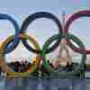 The Olympic rings are seen at Trocadero Plaza, the site of the opening ceremony's finale celebrations, overlooking the Eiffel Tower in Paris.