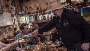 Chef Mustapha Kachetel serves a couscous royal in the restaurant Le Fémina, in Noailles.