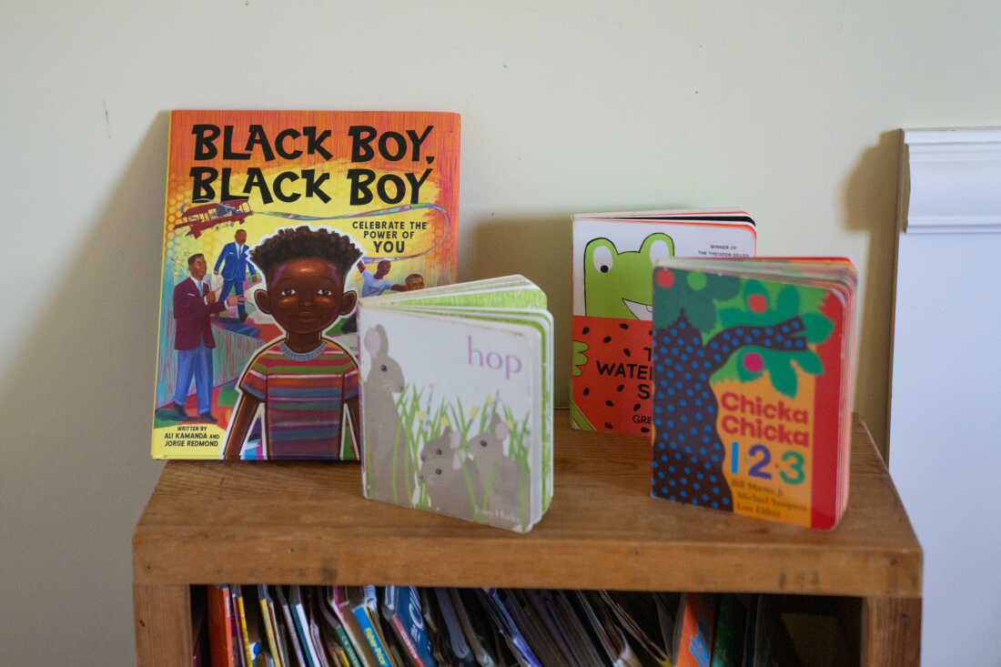 A bookshelf in Clark's home holds a selection of children's picture books.