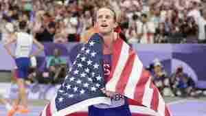 Cole Hocker, of the United States, celebrates after winning the men's 1500-meter final at the 2024 Summer Olympics