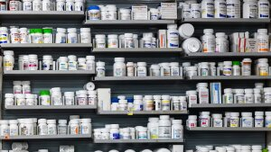 A major issue in the presidential race between both parties is the increase in prescription drug prices, an issue that especially energizes older voters. Medicare's new authority to negotiate drug prices is being touted by Democrats. In this image, shelves at a New York pharmacy are stocked with prescription medicines.