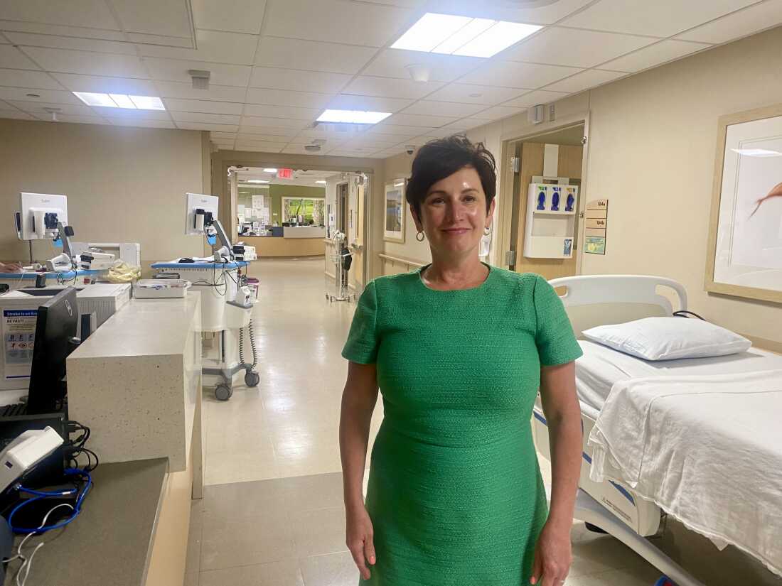 Barbara Cottrell, AtlantiCare's chief nursing officer, stands in the hallway of the hospital.