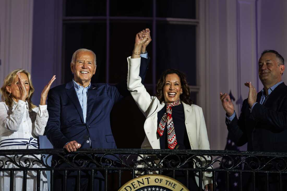 President Biden and Vice President Harris view the fireworks on the National Mall from the White House balcony on July 4, 2024.