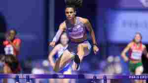 Sydney McLaughlin-Levrone of the U.S. competes in a women's 400-meter hurdles heat at the Paris Olympics on Sunday in Saint-Denis, France.