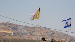 Israeli soldiers and armored vehicles near the West Bank town of Beita