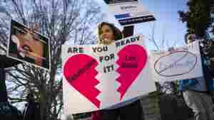 Penny Harrison and her son Parker Harrison rally against the live entertainment ticket industry outside the U.S. Capitol last year.