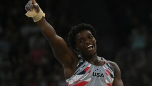 Frederick Richard reacts during the gymnastics men's team final Monday during the Paris 2024 Olympic Games at Bercy Arena. Frederick's enthusiasm, zeal and huge social media presence are fueling excitement in Paris and beyond.