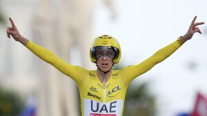 Tour de France winner Slovenia's Tadej Pogacar celebrates as he crosses the finish line to win the twenty-first stage of the Tour de France cycling race, an individual time trial over 33.7 kilometers (20.9 miles) with start in Monaco and finish in Nice, France, Sunday, July 21, 2024. (AP Photo/Daniel Cole)