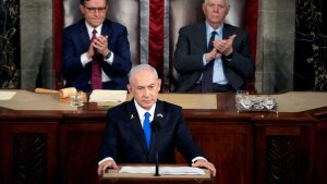 Israeli Prime Minister Benjamin Netanyahu speaks during a memorial ceremony in Tel Aviv on June 18.