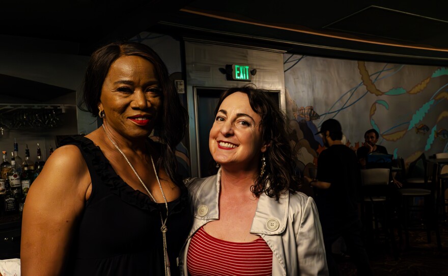 Kitsap-based vocalist and KNKX Community Advisory Council member Eugenie Jones, left, and KNKX Midday Jazz host Paige Hansen prepare to take over the stage after the All Things Considered broadcast from Bremerton concludes.