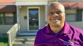 James Henley stands in front of the house he uses as a law office in Jackson, Mississippi, on Dec. 5, 2023.