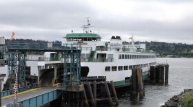 The Walla Walla ferry is docked at the Bremerton ferry terminal under a cloudy sky