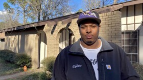 Jeremey Brown stands outside his Jackson, Mississippi, home on Feb. 23, 2024. Brown said he rarely received a water bill during the four years he's lived in the city until getting a massive, $1,396.99 bill in January.