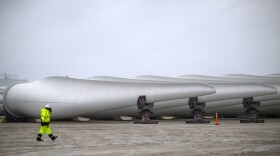 Wind turbine blades are lined up at the Connecticut State Pier in New London where the turbines are staged and assembled before being shipped to their offshore location in the sound. Connecticut Department of Energy and Environmental Protection (DEEP) Commissioner Katie Dykes said during a press conference at the Connecticut State Pier in New London, Wednesday, August 07, 2024, that once it’s completed, the 2,400 megawatts of offshore wind will be a significant source of clean energy. The federal government is giving the region $389 million to improve the electrical grid and part of that money will go toward this wind project.