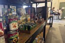 Stacks of donated goods line the shelves at the Good News Outreach food bank, Wednesday, July 31, 2024, in Tallahassee, Fla. Florida is one of 13 states that is not participating in a federal hunger relief program this summer that helps families in need buy groceries. (AP Photo/Kate Payne)