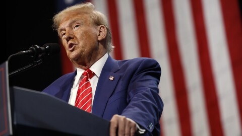 Former President Donald Trump delivers remarks during a campaign rally in Atlanta on Oct. 15. With the election in its closing weeks, Trump and other Republican candidates have been  focusing many of their campaign ads around the issue of transgender rights.