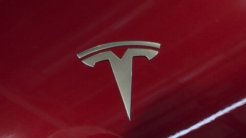 The logo of Tesla car is pictured at the Paris Auto Show, in Paris on Oct. 14, 2024.