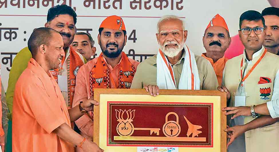 चुनौतीः अलीगढ़ की रैली में प्रधानमंत्री नरेंद्र मोदी और मुख्यमंत्री योगी आदित्यनाथ