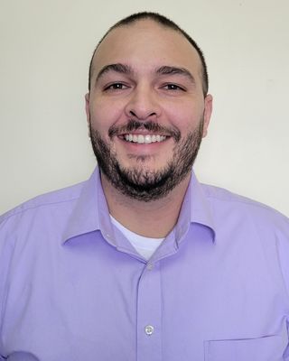 Photo of Jayson Reyes, Psychiatric Nurse Practitioner