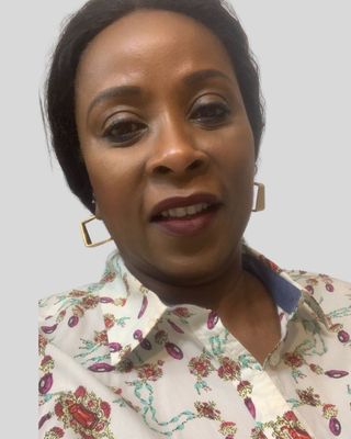 Photo of Jokotola Ayoajayi, PMHNP, Psychiatric Nurse Practitioner