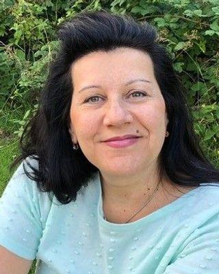 Photo of Genoveva Muresan, MSc, PNCPS Acc., Psychotherapist