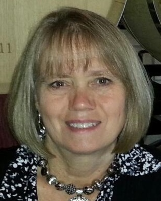 Photo of Carol Folisi, LCPC, CADC, CEAP, Counselor