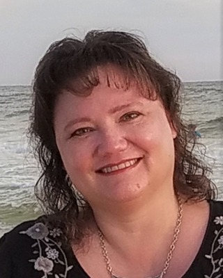 Photo of Lisa Laney, MS, LPC, LMFT, RPT, Licensed Professional Counselor