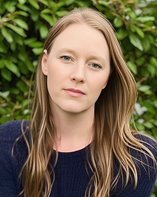 Photo of Emily Hostland, RP, MA, ExAT, DTATI, Registered Psychotherapist