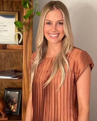 Photo of Kelsey Backes, LPC, LMHC, RPT, MEd, Counselor