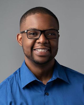 Photo of Rasheed Akinfolarin, LMHC, Counselor