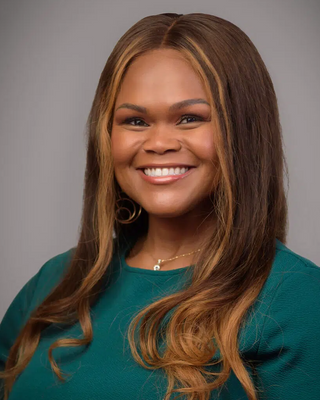 Photo of Dr. Andreya Reed, MD, Psychiatrist