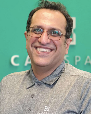 Photo of Hossein Kaji, BSc, MA, PhD, Registered Psychotherapist