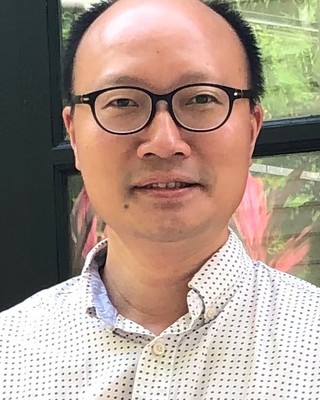 Photo of Raymond Man-Wai Kwok, MA, HKMFT, Psychotherapist