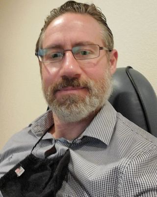 Photo of Travis Chase, PMHNP, FNP-C, Psychiatric Nurse Practitioner