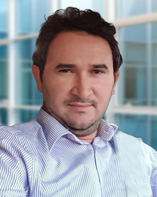 Photo of Halit Khaled Ozer, RP, MPS, BE, Registered Psychotherapist