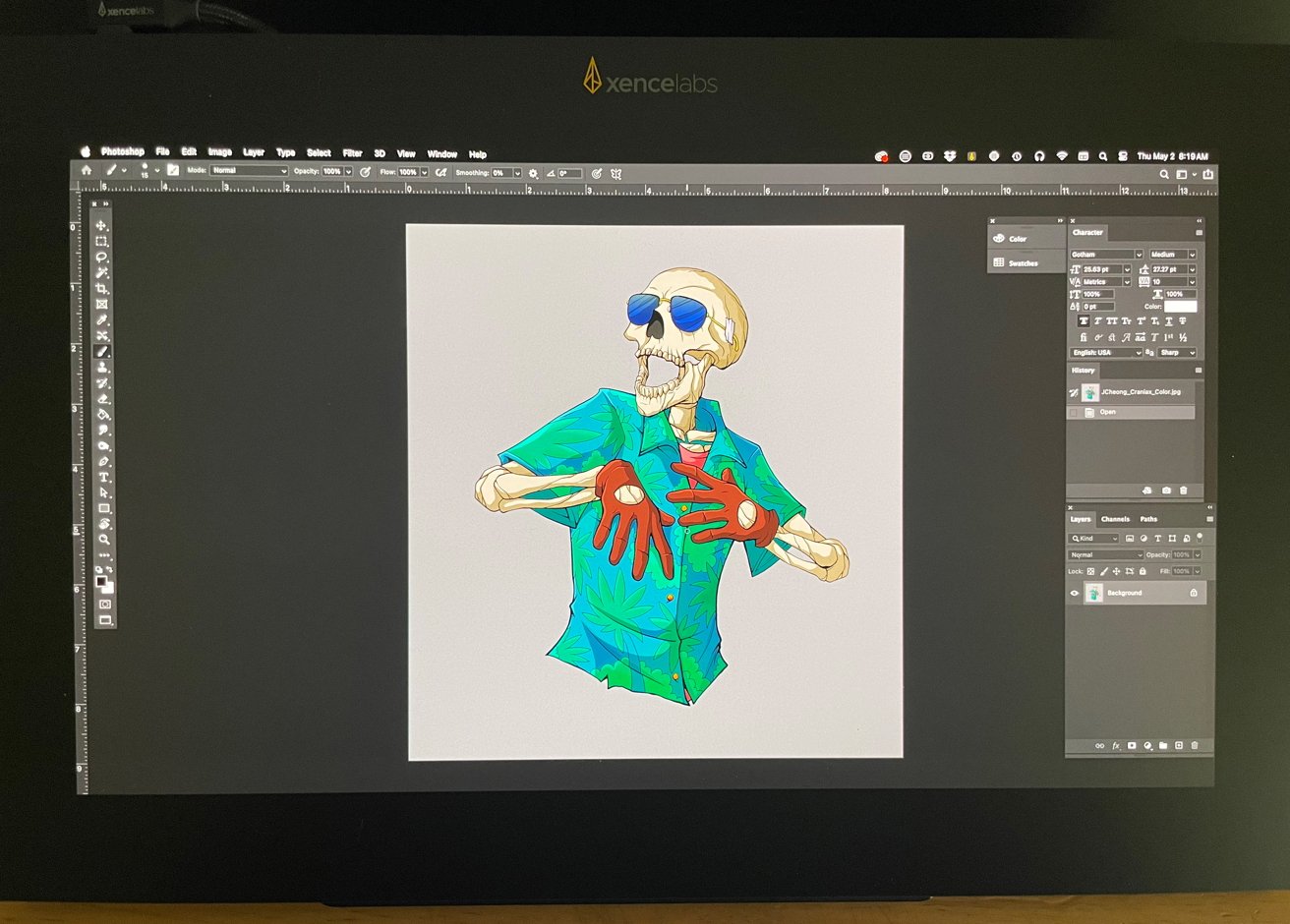 Skeleton wearing sunglasses, a Hawaiian shirt, and gloves in a digital art program on a computer screen.