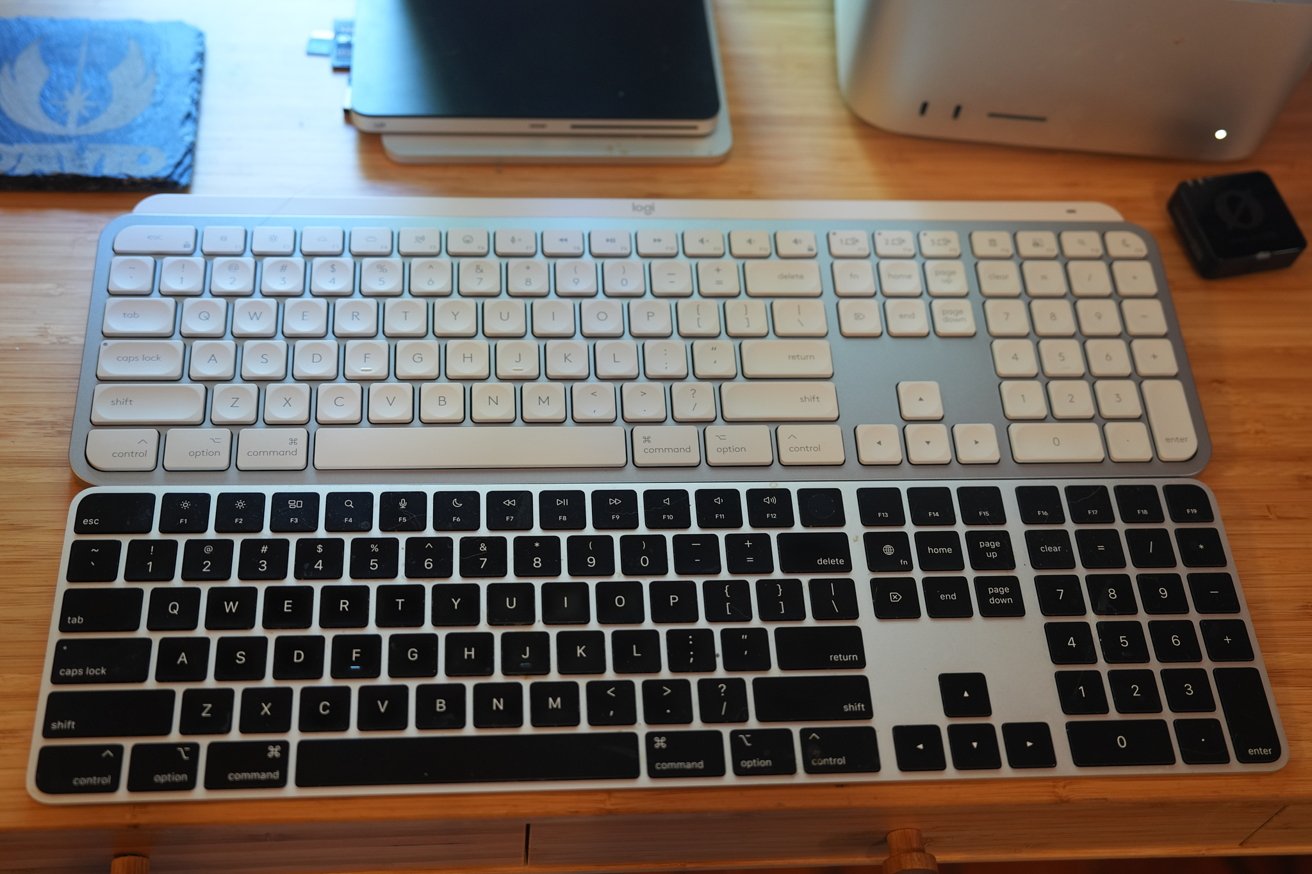 The Logitech MX Keys S (above) and the Apple Magic Keyboard (below).