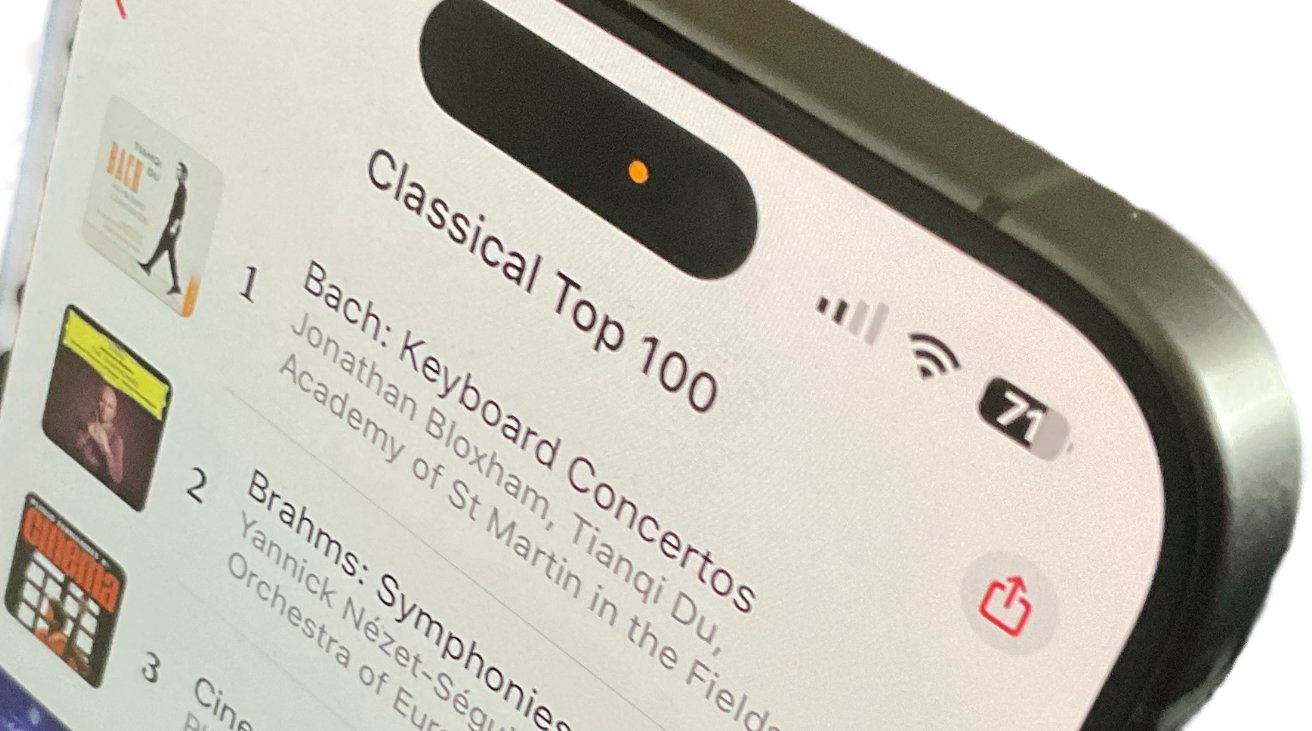 Smartphone screen displaying Classical Top 100 playlist with titles by Bach and Brahms, battery at 71%, and a share icon.