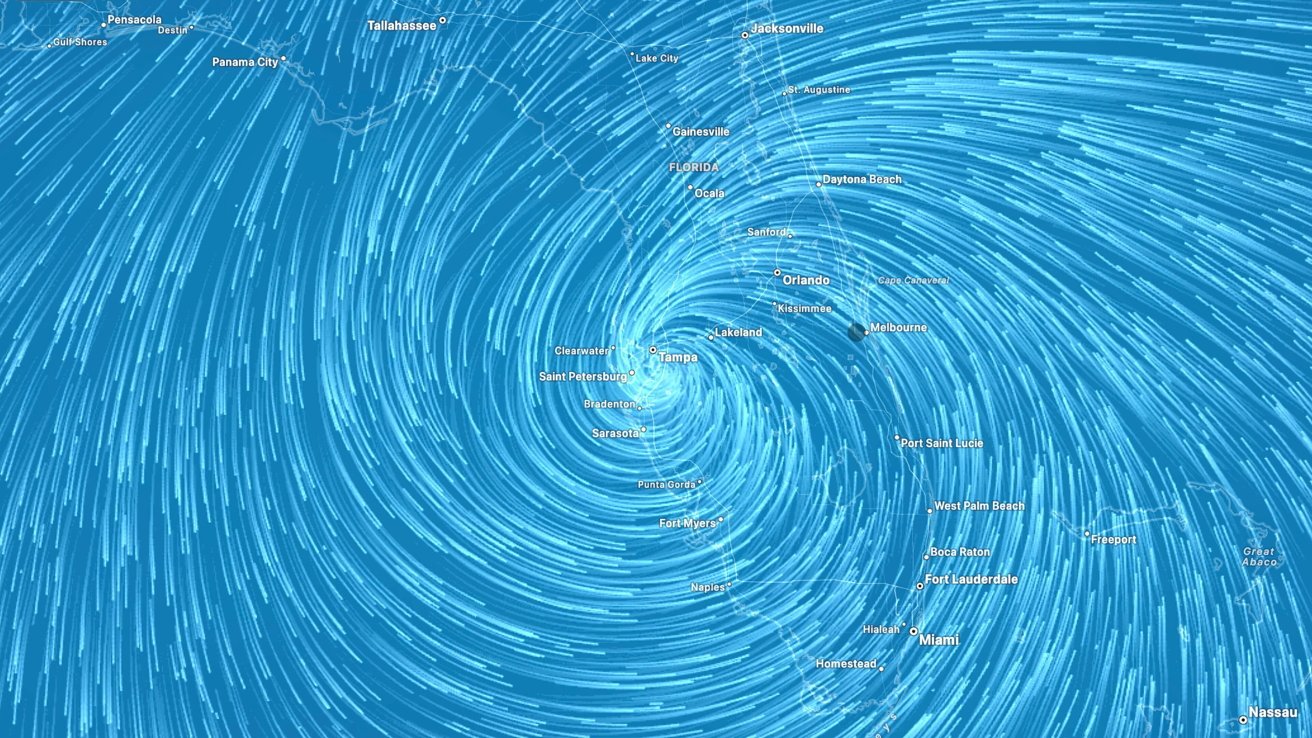 Map of Florida showing swirling blue wind patterns, indicating a storm near Tampa, with surrounding cities labeled.