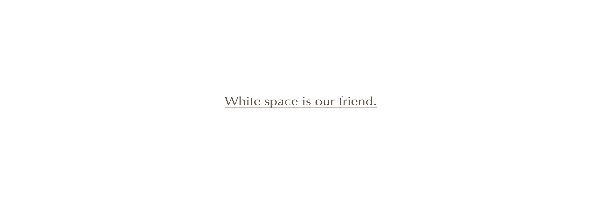 A single line of text on a large white background that reads, "White space is our friend."