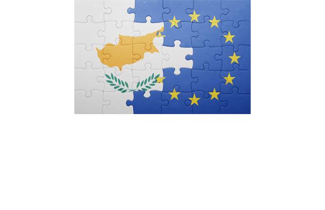 Puzzle with the National Flag of the Republic of Cyprus and the European Union Flag