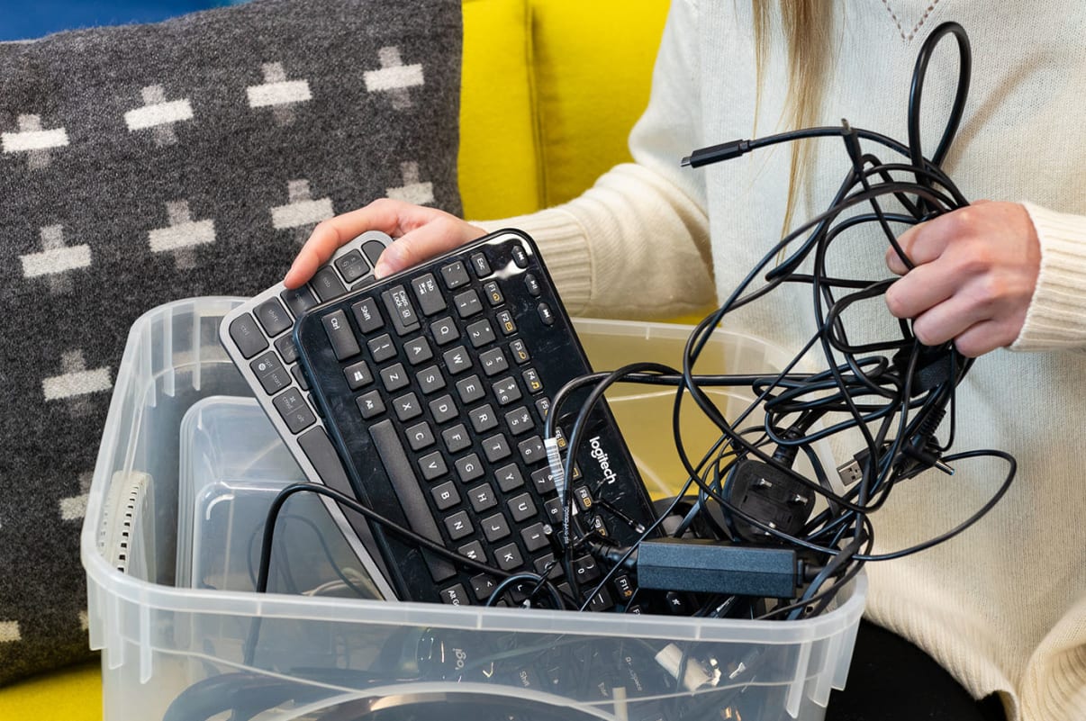 Used computer accessories packed in a box