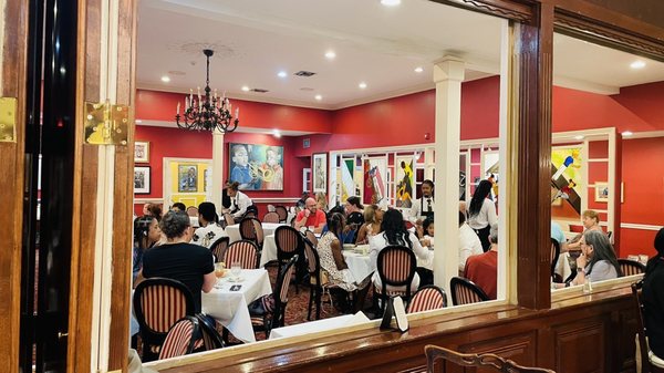 Photo of Dooky Chase's Restaurant - New Orleans, LA, US. Colorful Interior