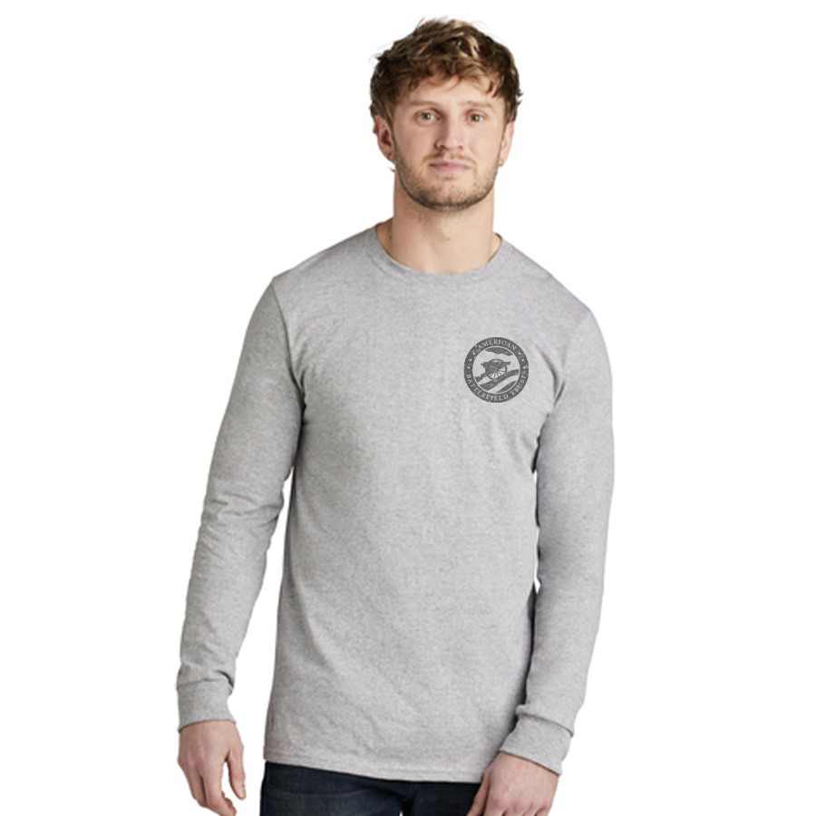 Man wearing long sleeve gray t-shirt with ABT's circle logo on the left chest