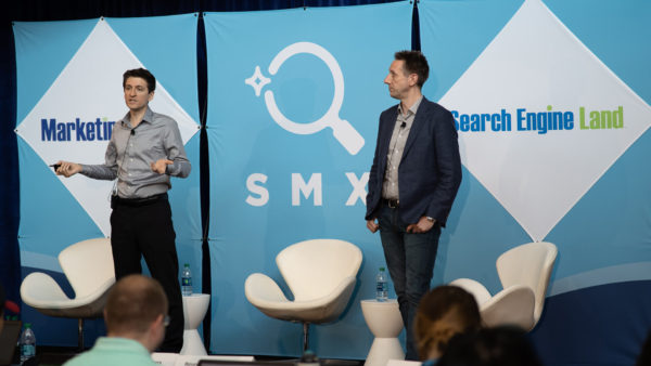 Fili-and-Frederic-speaking-onstage-SMX-Advanced-2019-staff-1920