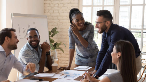 Group-of-employees-at-a-board-room-table