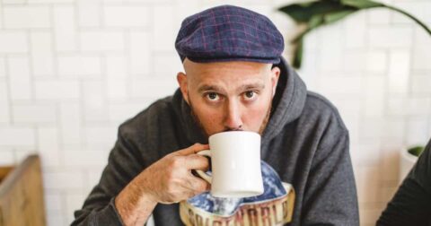 Justin Barker With Coffee, photo by Robin Weir